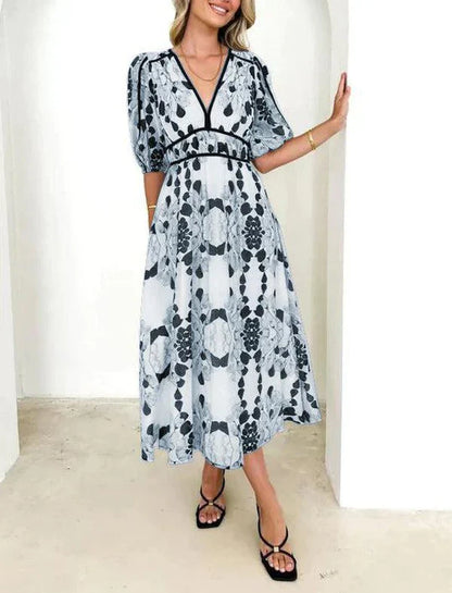 Abigail - robe midi bleue chic à manches courtes et décolleté en V